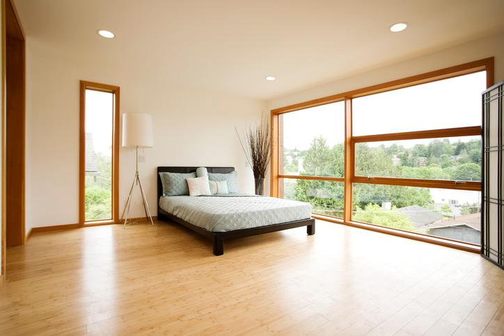 Modern Spacious Bedroom with Bamboo Flooring