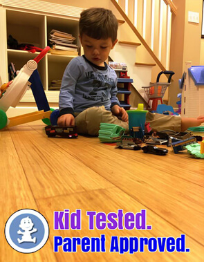 Child playing with toys on strand woven bamboo flooring