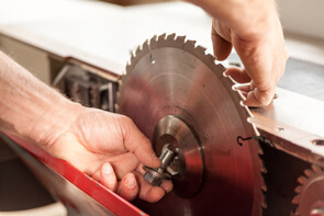 cut planks with saw